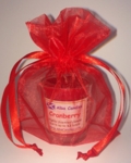  Cranberry Alba candle in a red gift bag 